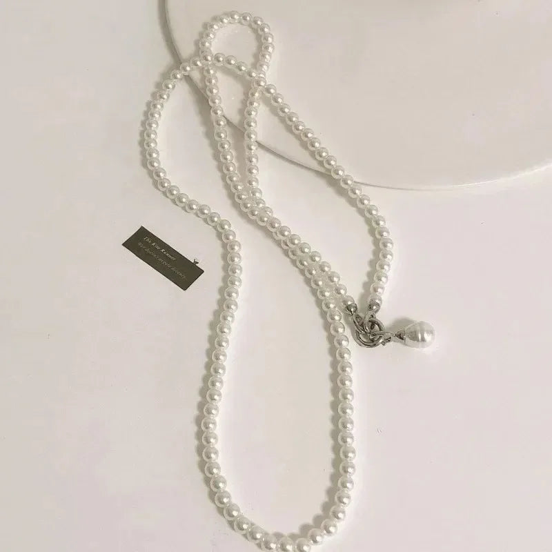Personality Design Fashion Pearl Body Chain Pearl Gyro